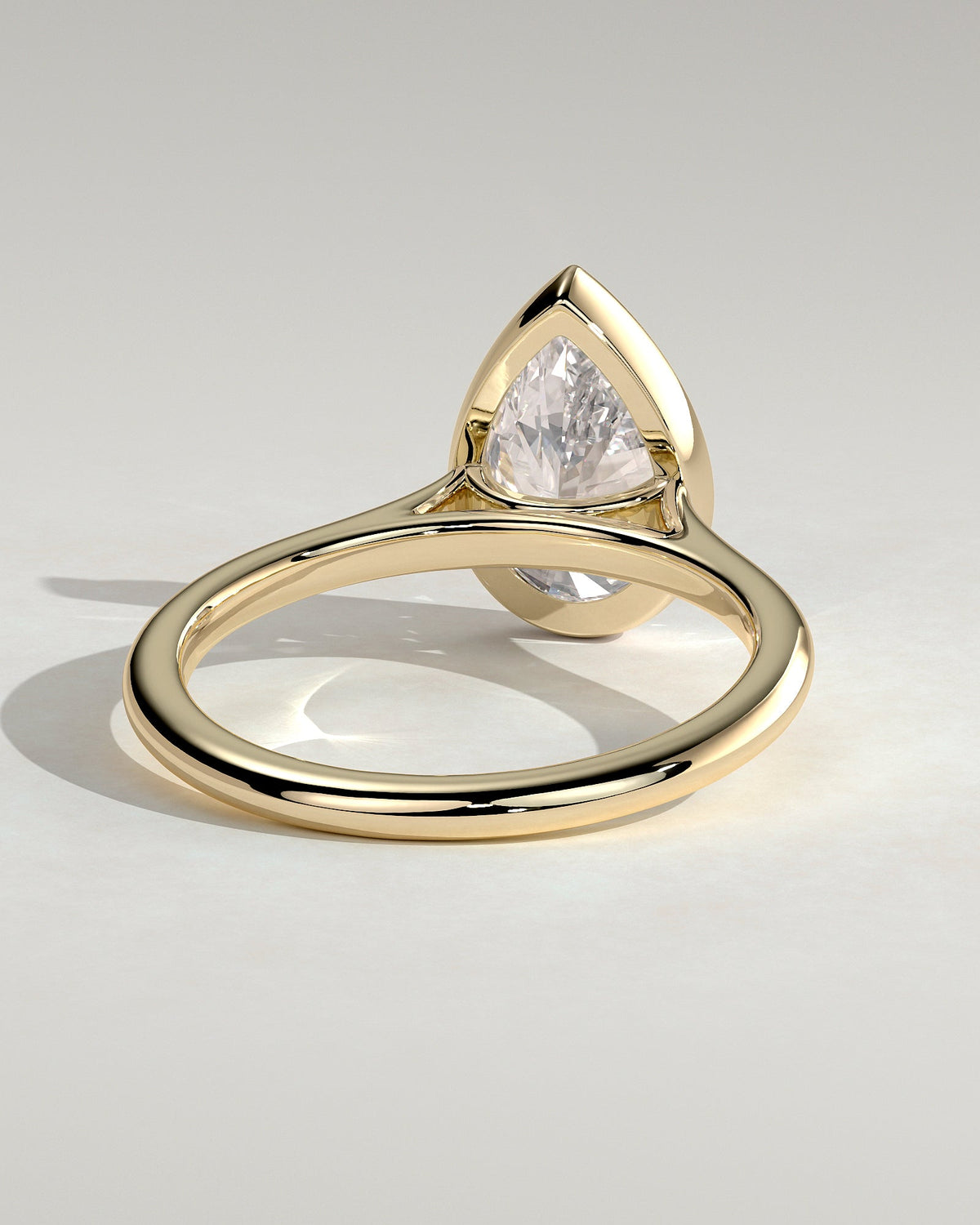 Pear Solitaire Bezel Lab Grown Diamond Engagement Ring