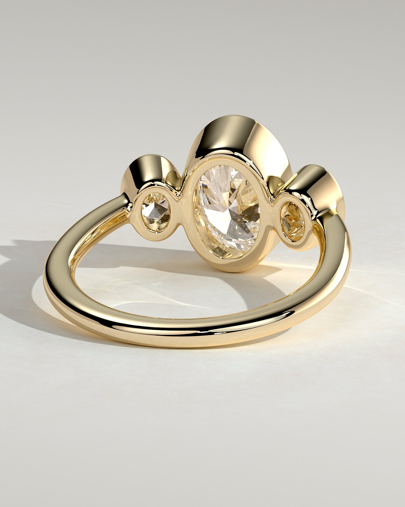 Oval Three Stones Bezel Lab Grown Diamond Engagement Ring