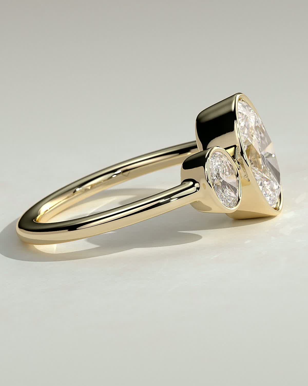 Oval Three Stones Bezel Lab Grown Diamond Engagement Ring