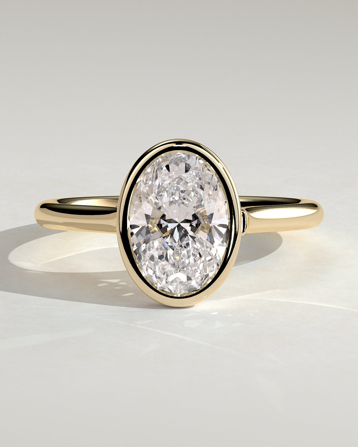 Oval Solitaire Bezel Lab Grown Diamond Engagement Ring
