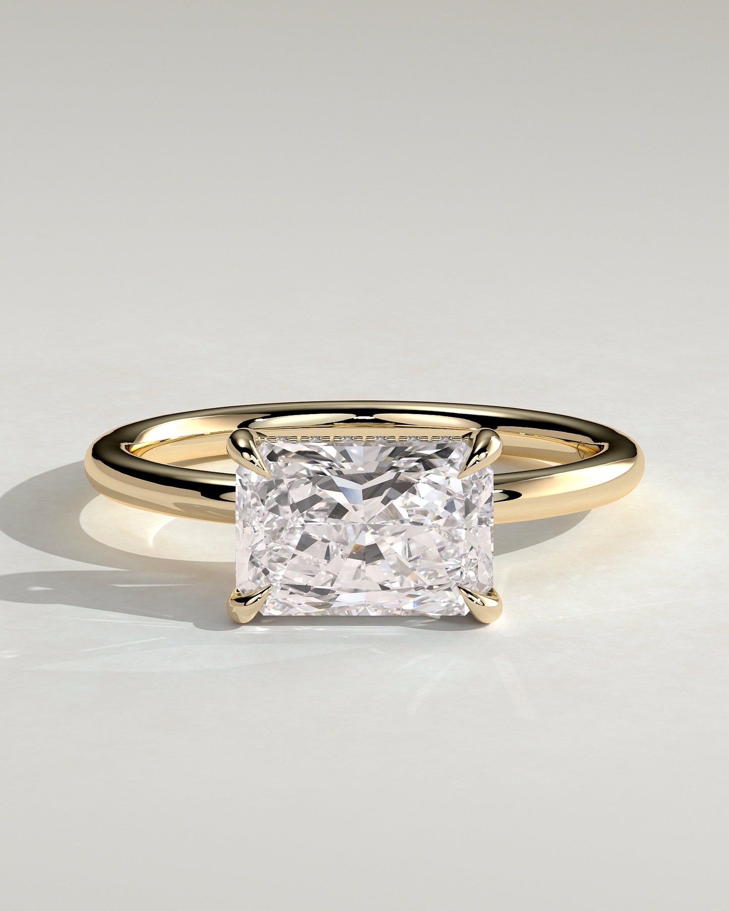 Radiant Hidden Halo and East West Lab Grown Diamond Engagement Ring