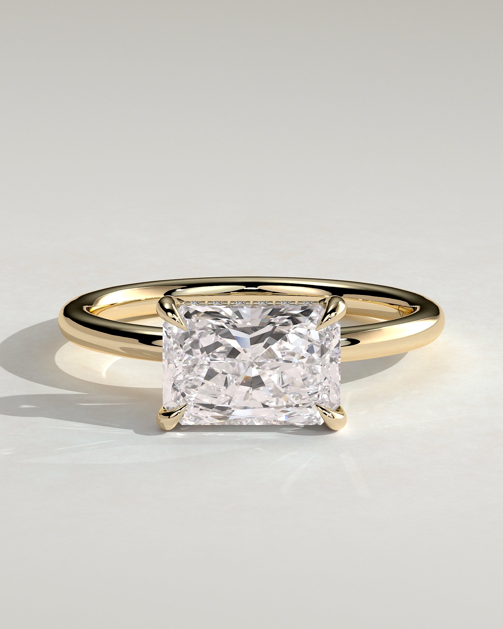 Radiant Hidden Halo and East West Lab Grown Diamond Engagement Ring