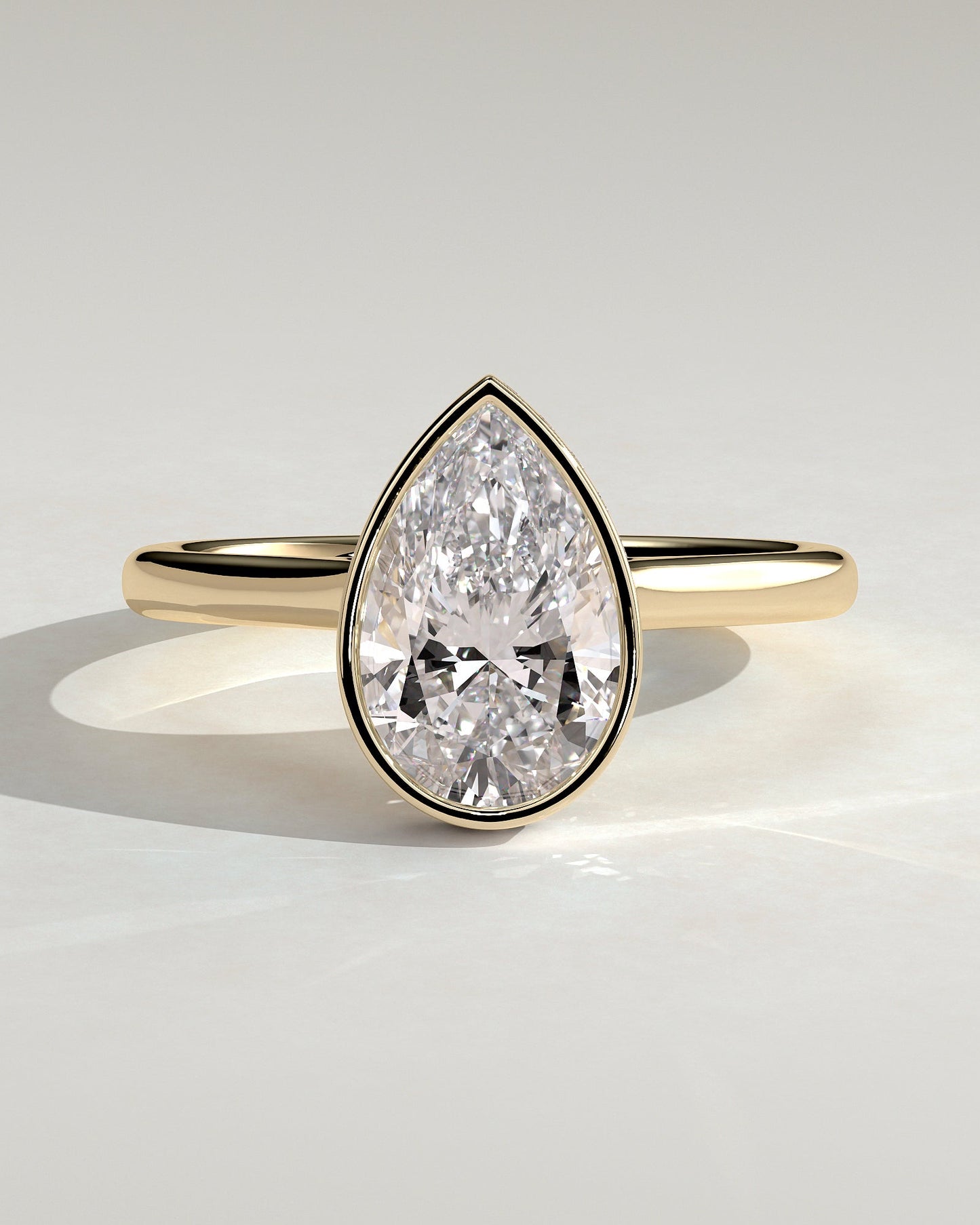 Pear Hidden Halo Bezel Lab Grown Diamond Engagement Ring