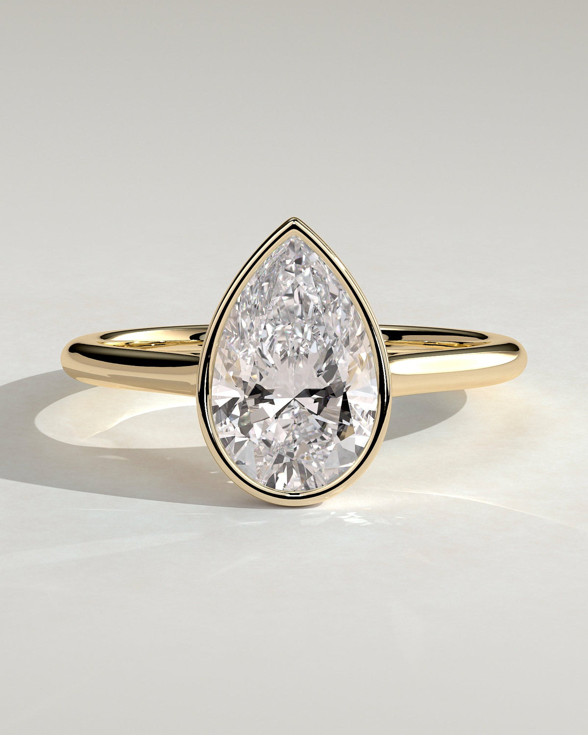 Pear Solitaire Bezel Lab Grown Diamond Engagement Ring