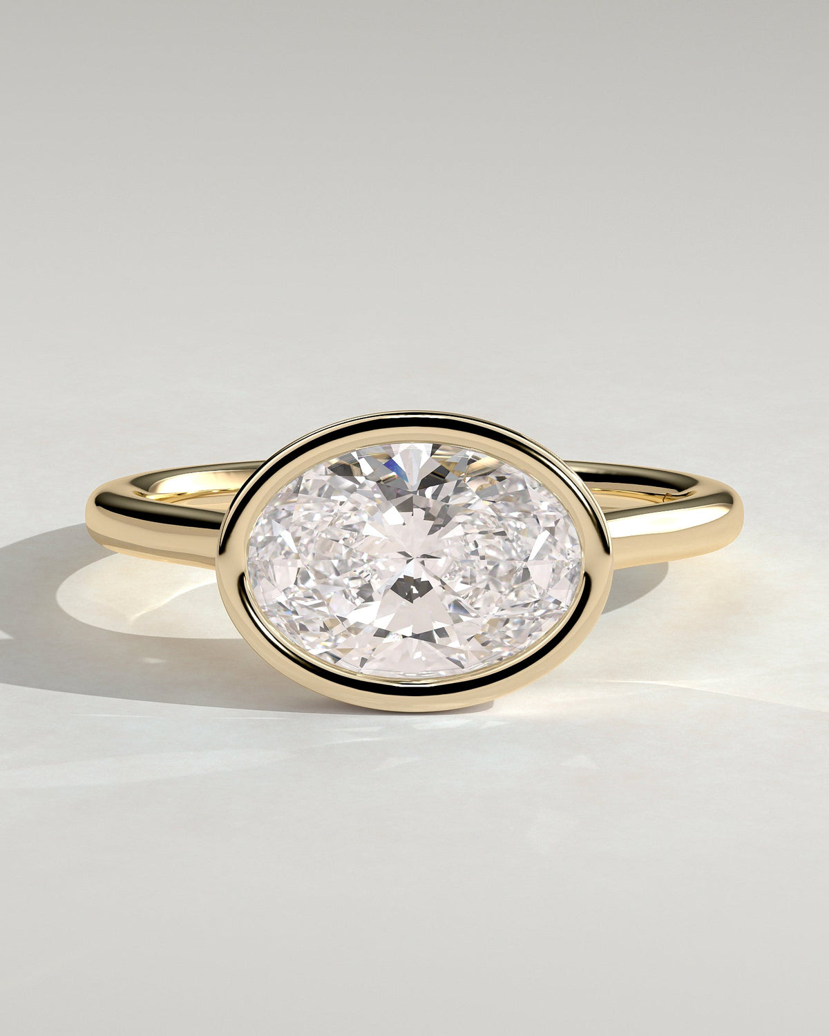Oval Bezel East West Solitaire Lab Grown Diamond Engagement Ring